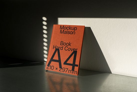 A4 hardcover book mockup in natural light, showing cover size and design potential for digital asset marketplace.