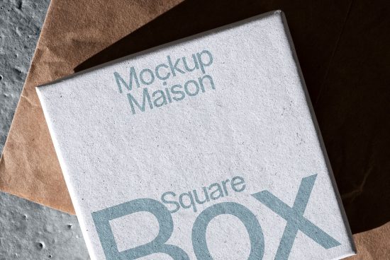 Close-up view of square box packaging mockup with eco-friendly design, ideal for branding presentation and design projects.