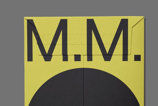 Bold black letter M on yellow background, geometric font, poster design mockup, modern typography, graphic design asset.