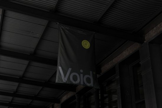 Black vertical flag mockup hanging on a dark urban building, featuring bold typography design, ideal for branding presentations.