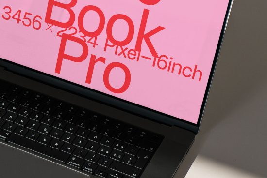 Laptop screen displaying font mockup design, vibrant pink background with bold typography, designers' digital asset preview.