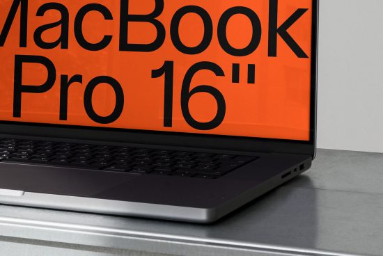 Close-up view of a MacBook Pro 16 inch on a desk showcasing screen detail, ideal for mockups or tech-themed design assets.