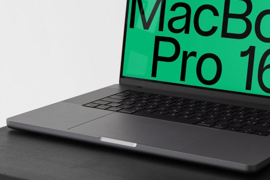 Close-up view of a MacBook Pro 16-inch laptop on a desk showcasing screen for mockup templates, perfect for designers presentation needs.