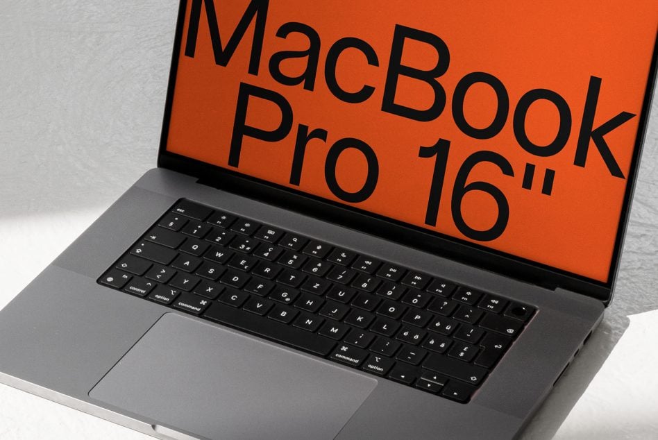 MacBook Pro 16 inch screen mockup showing orange design template