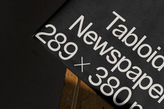 Close-up of a font showcase on a tabloid newspaper mockup, with design-oriented typography and layout details visible. Perfect for font and template display.