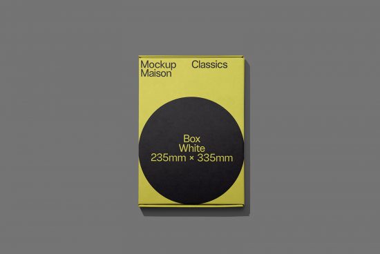 Yellow product box mockup with black circle design on gray background, 235mm x 335mm packaging, ideal for presentations and branding.
