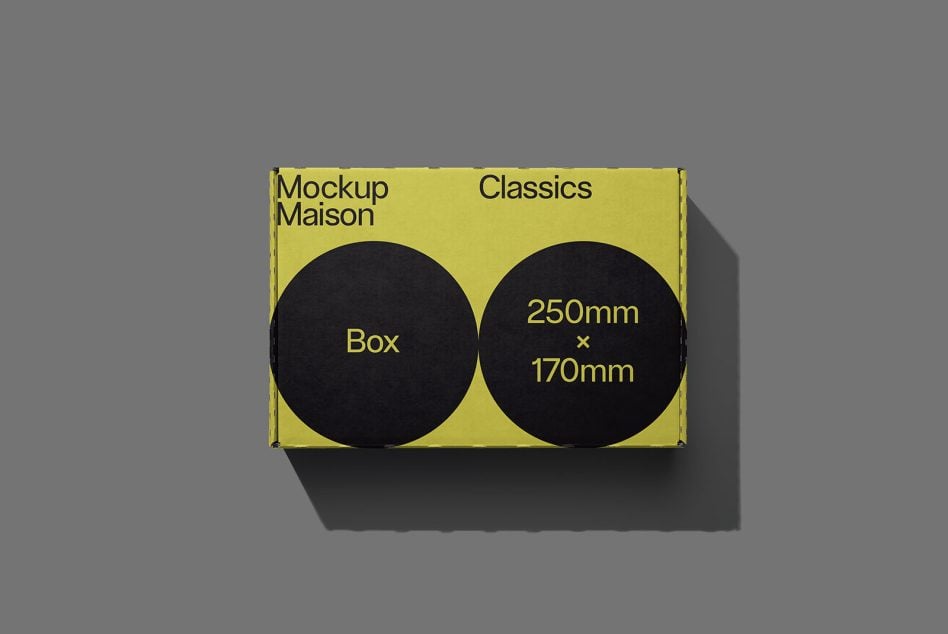Top-down view of yellow box mockup with two black circles displaying size measurements