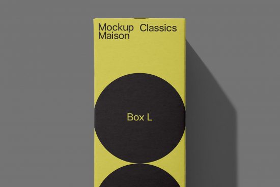 Packaging mockup of a yellow box with black circles, product presentation, sleek design, template for designers.