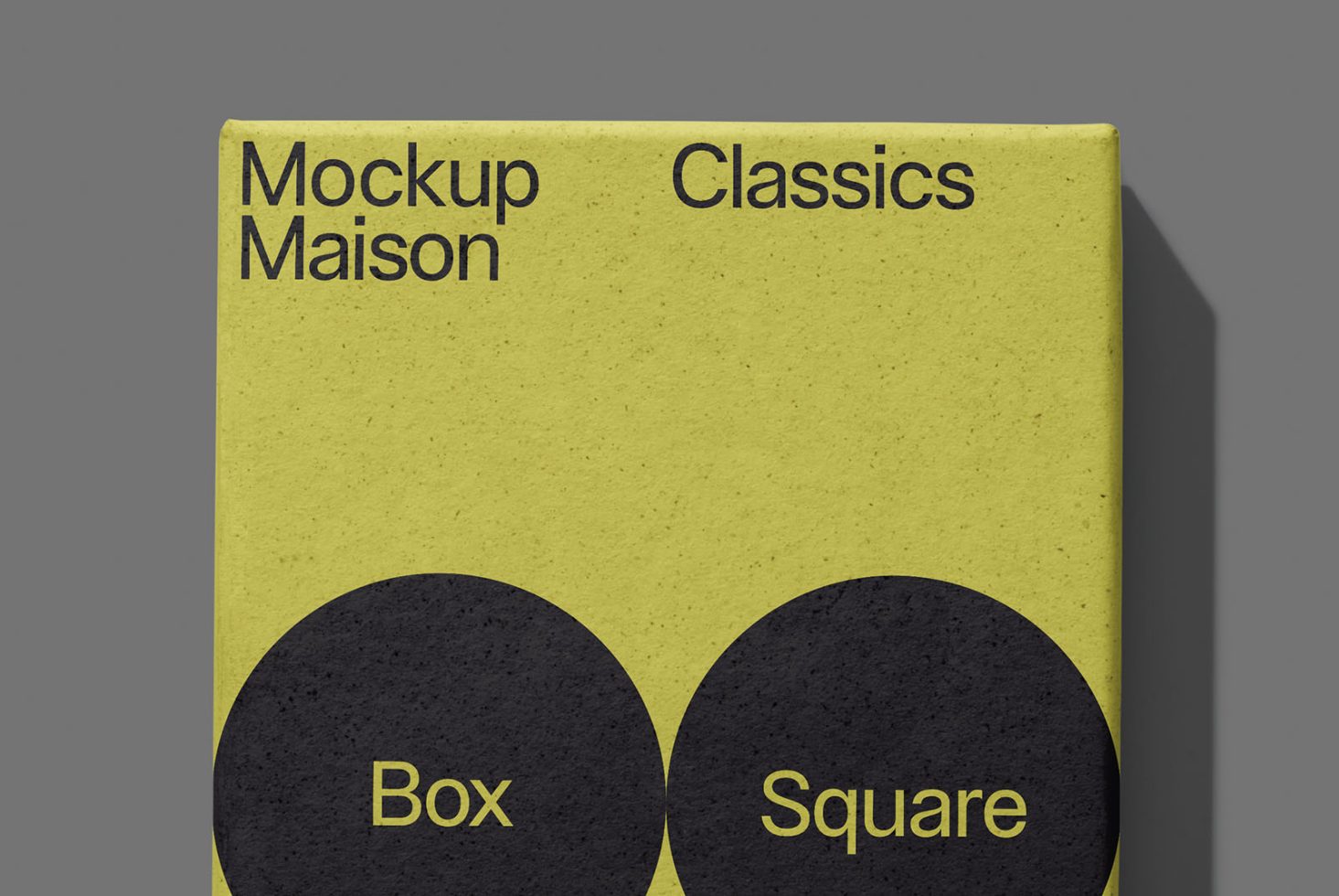 Yellow square box mockup with elegant typography, design packaging preview, textured surface, shadow overlay, realistic 3D render for portfolio.