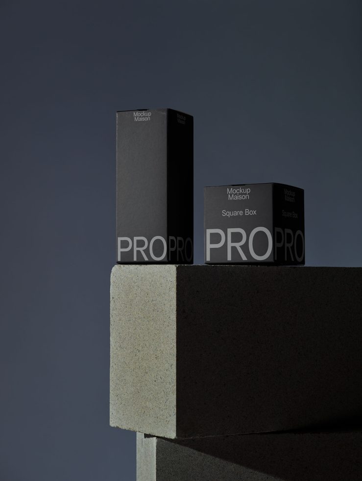 Elegant square box mockup on concrete plinth for product presentation, packaging design showcase, minimalist style, by Mockup Maison.