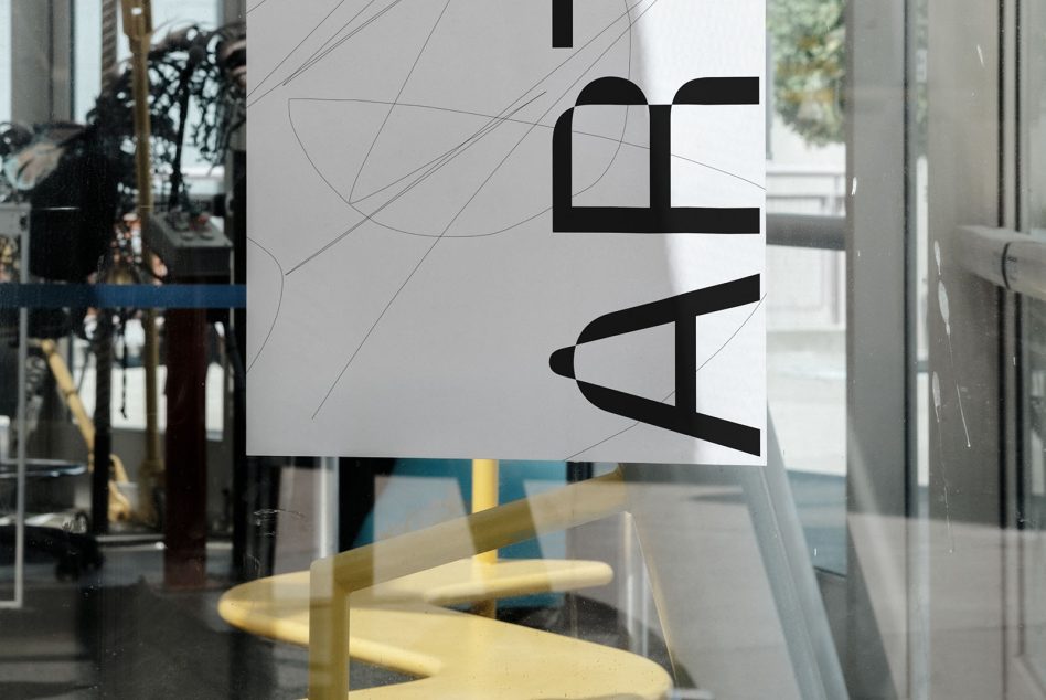 Horizontal glass mockup in modern space with black type, geometric line pattern