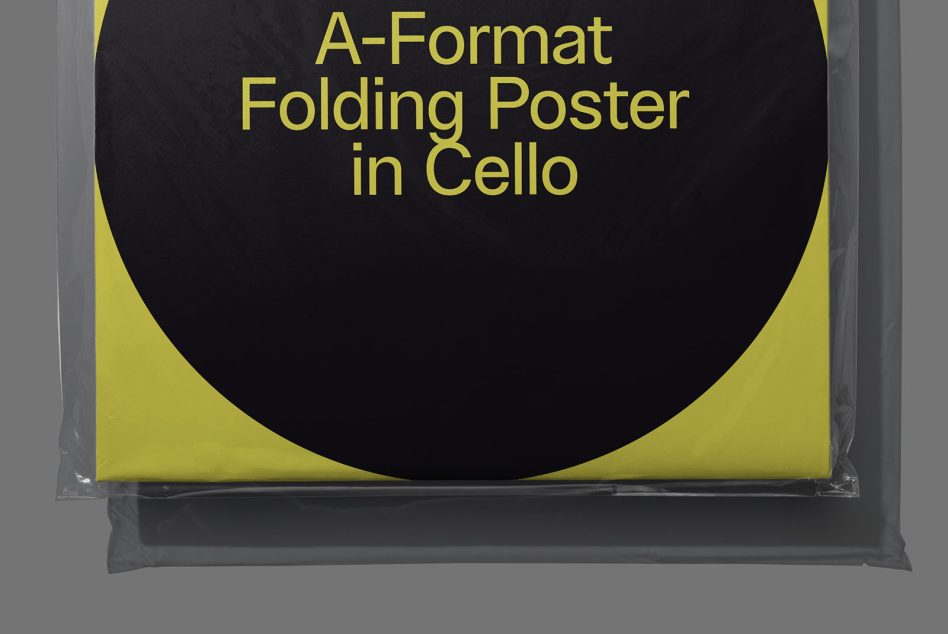 A-Format black and yellow folded poster mockup in cellophane wrapping, perfect for presenting design projects and graphics.