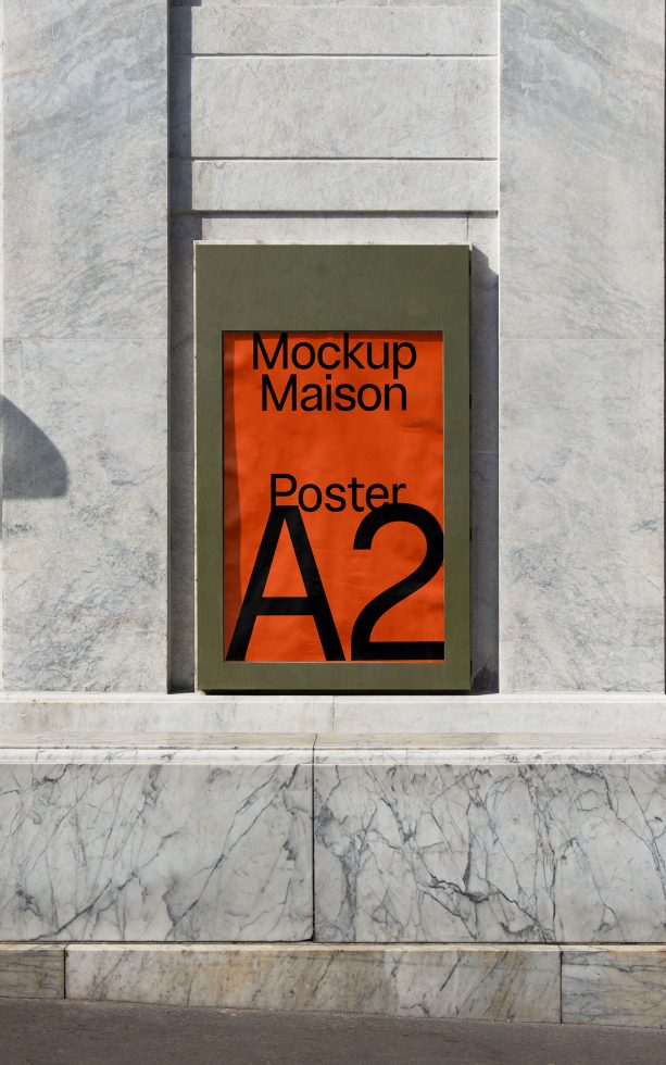 Realistic A2 poster mockup displayed on marble wall for graphic designers and advertisers to showcase designs.