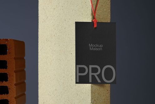 Elegant tag mockup design hanging against a textured backdrop, perfect for presentations and branding projects for designers.