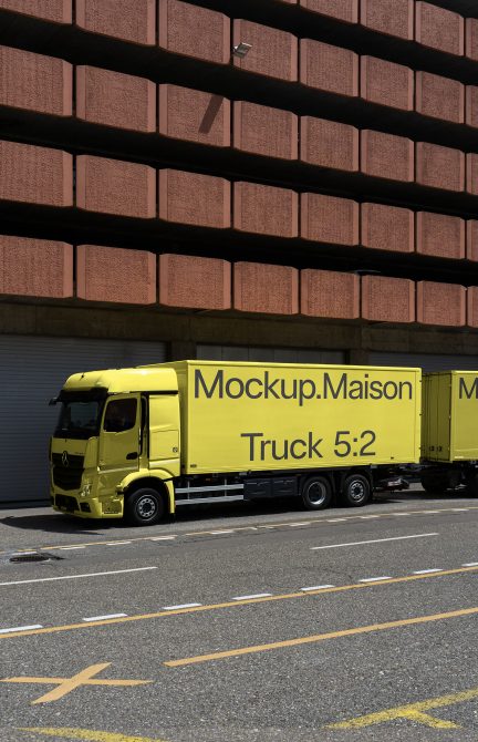 Yellow delivery truck mockup template parked in urban setting perfect for branding projects, vehicle wrap designs, and advertising visuals.