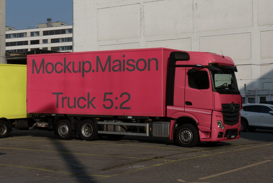 Pink delivery truck mockup parked on urban street for vehicle branding, advertising design, and corporate identity presentation.