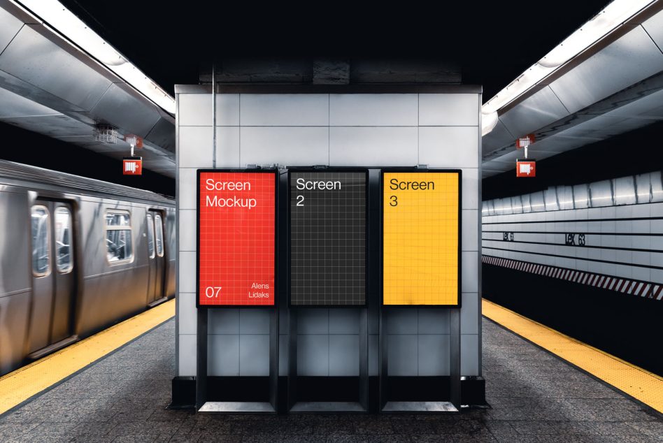 Three colored screens in subway tunnel showing red, black, yellow options