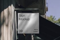 White text on interior directional sign with metal frame mounting