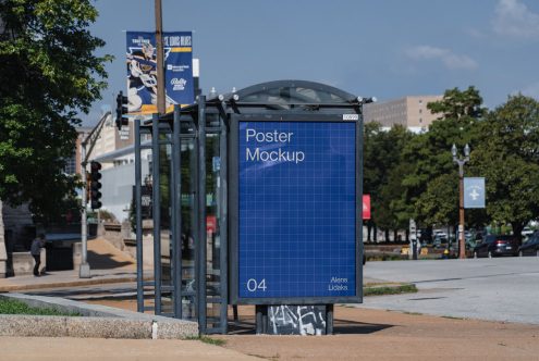 Urban bus stop poster mockup on a sunny day for outdoor advertising design presentations, with clear blue sky and city environment.