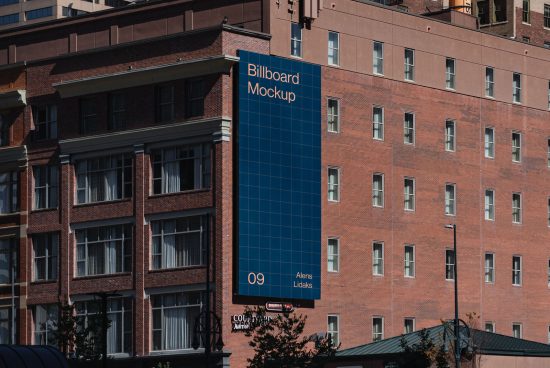 Urban outdoor billboard mockup on a building facade, clear blue sky, ideal for advertising and branding design presentations.