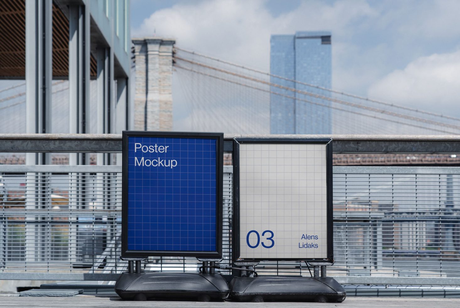 Outdoor poster mockup displays in urban setting with clear sky and bridge backdrop, ideal for realistic design presentations in mockups category.