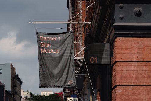 Outdoor banner and sign mockup on a building wall, urban setting for advertising design, realistic graphic presentation tool.