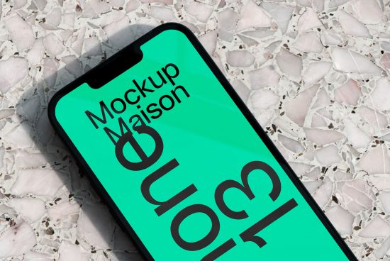 Smartphone screen mockup on marbled background displaying design text for digital asset, ideal for showcasing app interfaces and web designs.