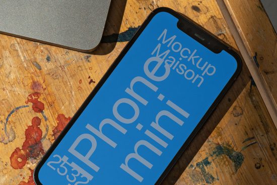 Smartphone mockup on a wooden table showcasing design, tool for designers, digital asset, presentation, realistic display, creative mockup template.