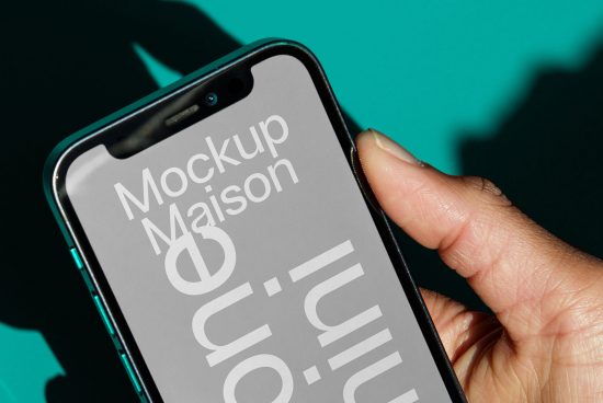 Hand holding smartphone with reflective screen mockup design, vivid shadow, ideal for showcasing UI/UX projects, displayed on digital asset marketplace.