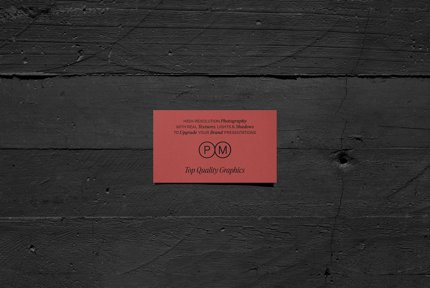 Business card mockup on a black wooden texture, showcasing sharp details and realistic shadows, perfect for brand identity presentations.