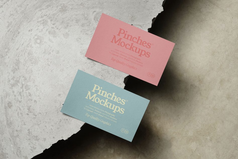 Business card mockup on textured background showing two cards with elegant design suitable for designers seeking realistic presentation graphics.