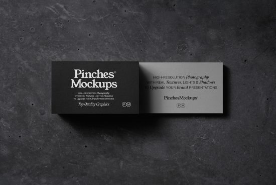 Elegant business card mockup on dark textured background, showcasing front and back design for professional branding presentations.