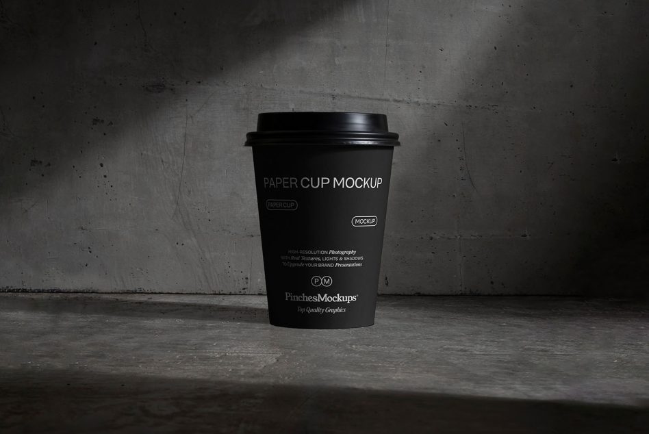 Realistic paper cup mockup on textured background for branding presentations, suitable for designers looking for high-quality mockups in the category of Templates.