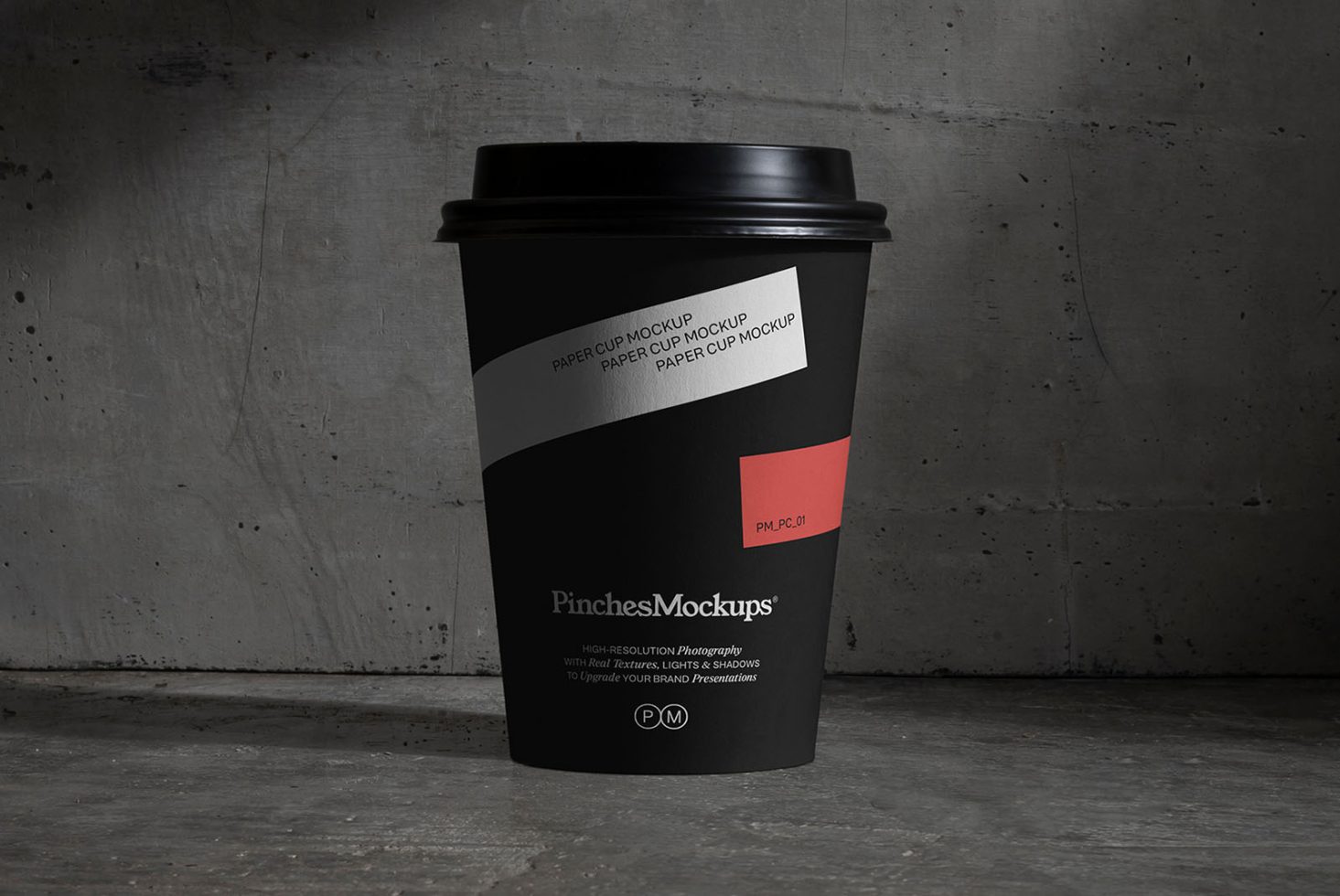 Professional paper coffee cup mockup on a gritty concrete background perfect for branding presentations and design projects in the Mockups category.