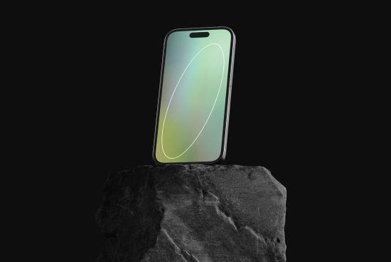 Smartphone on rock displaying screen gradient for mockup, modern device showcase, isolated on black, digital asset for design presentation.
