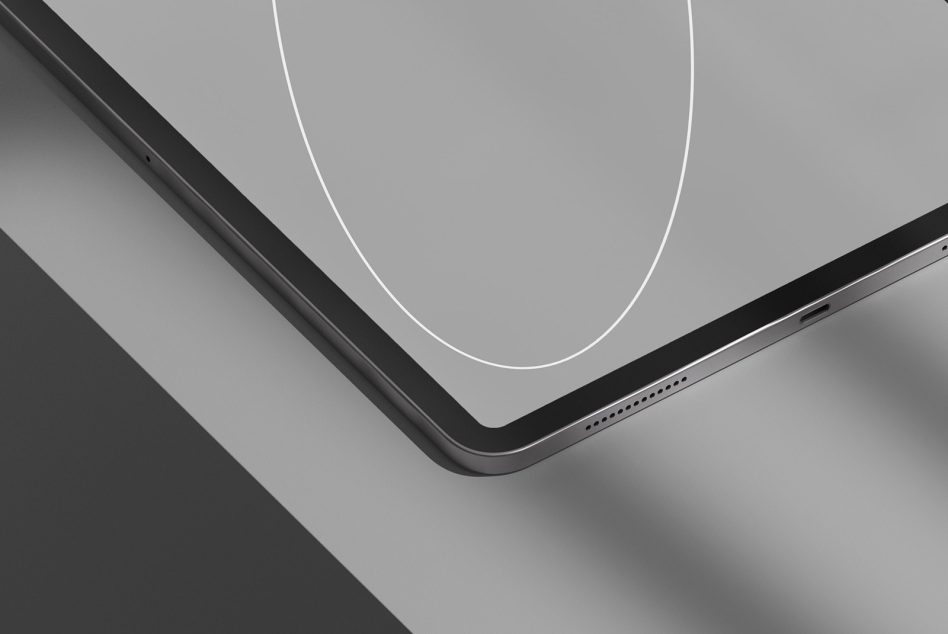 Tablet edge detail showing speaker ports with soft shadow, minimalist line art