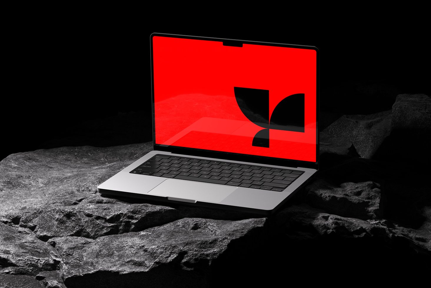 Laptop with red screen mockup on a rocky surface, showcasing modern device display design for presentations and digital portfolios.