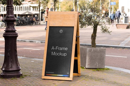 Outdoor A-Frame chalkboard mockup on a city sidewalk, realistic urban setting, ideal for display advertising design.