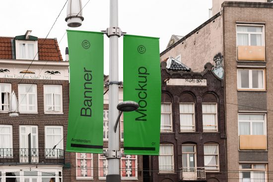 Vertical banner mockup hanging on a street lamp post with urban buildings in the background, clear design presentation tool for advertisers.