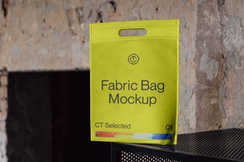 Yellow fabric tote bag mockup on textured background, editable design, realistic texture, eco-friendly bag for presentations, digital asset.