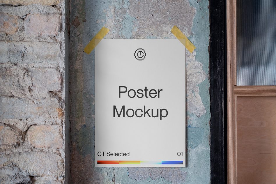 White poster taped to weathered brick wall with yellow tape strips