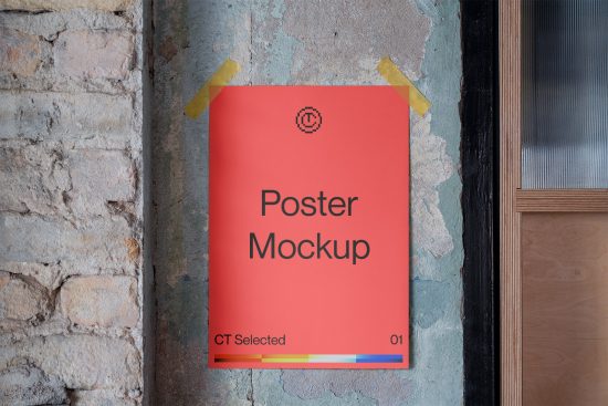 Red poster mockup taped to a textured brick wall next to a glass door, offering realistic template for designers' presentations.
