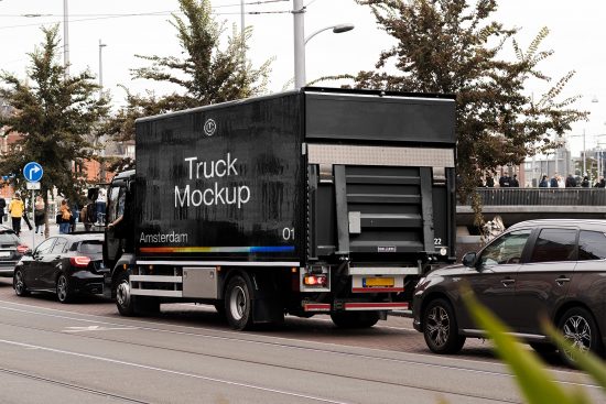 Black delivery truck mockup with clear side for branding in an urban street scene, ideal asset for designers to display logos or advertising.