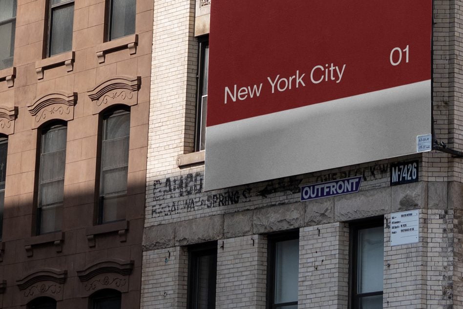 Red building sign mockup over storefront on street level