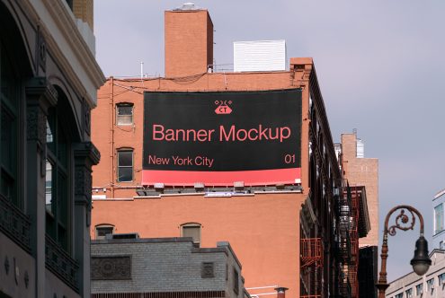 Dark banner mockup with coral text on brick building rooftop