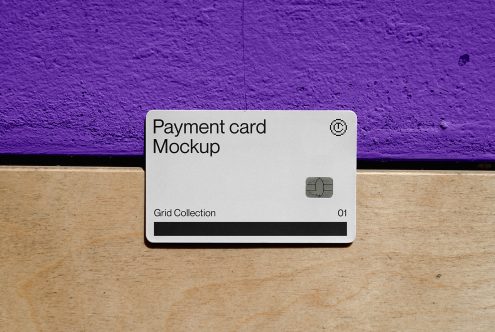 White payment card mockup on purple, tan, black striped surface backdrop