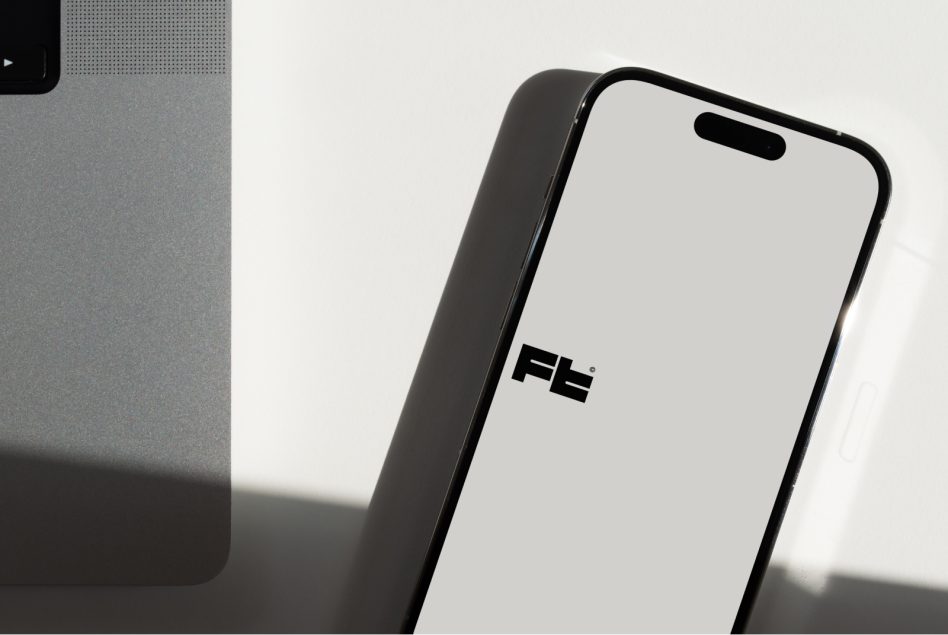 Smartphone mockup angled view with blank screen next to gray fabric swatch