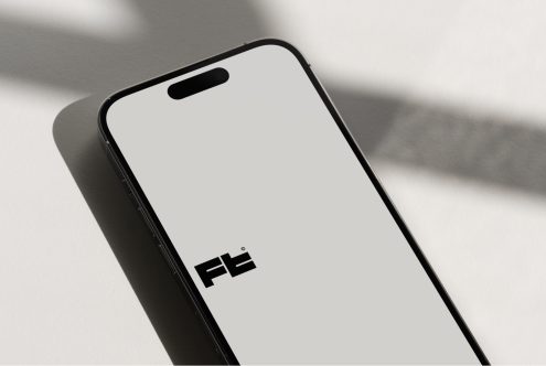 Device mockup from elevated angle casting dramatic natural light shadows