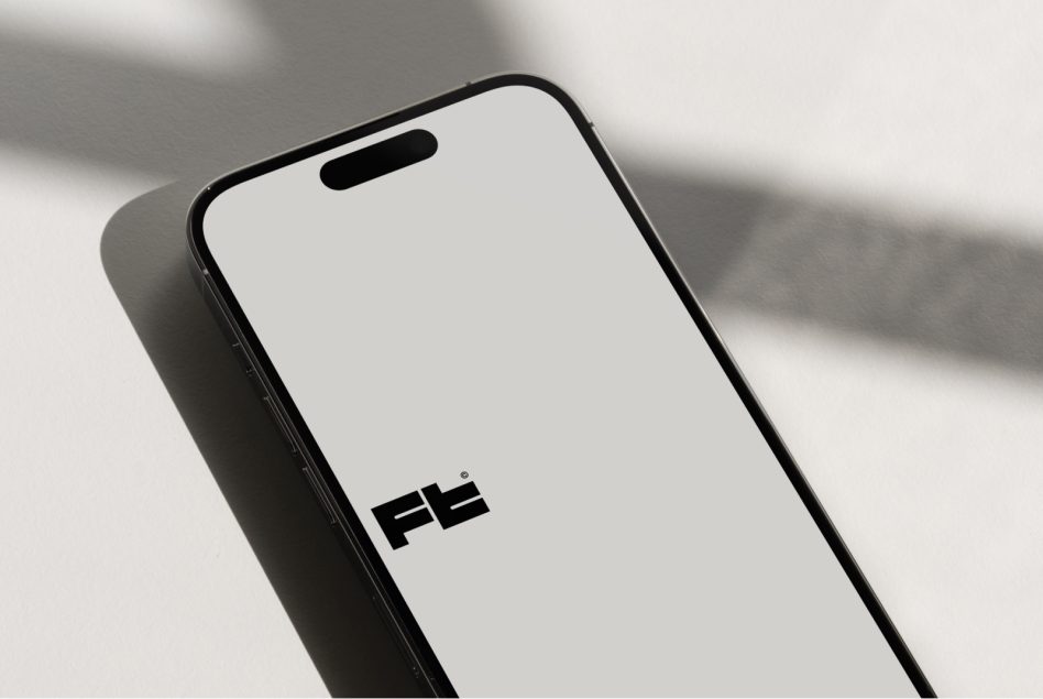 Device mockup from elevated angle casting dramatic natural light shadows
