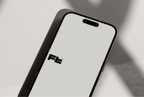 Modern phone display mockup shot from angled view with natural shadows